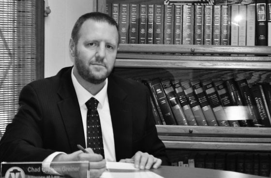 Attorney Chad G. Greiner at his desk